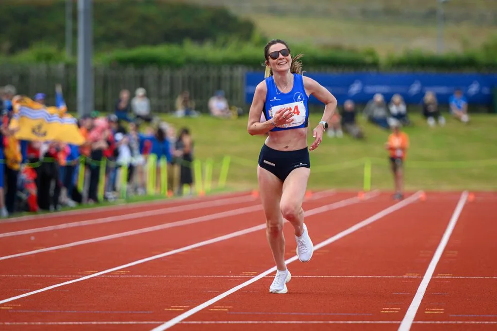 Athlete running on track